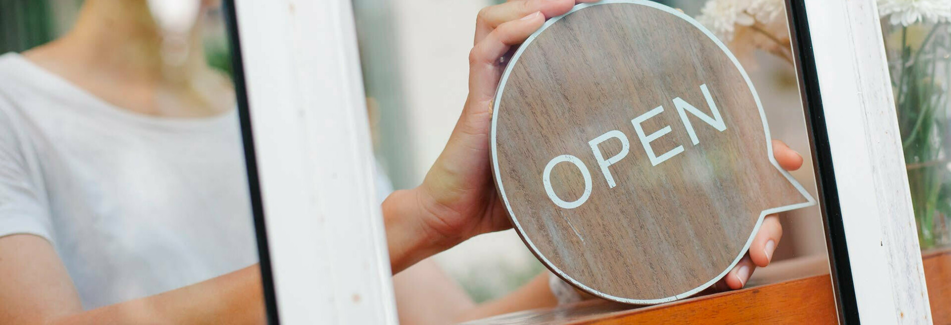 Woman with Open Sign