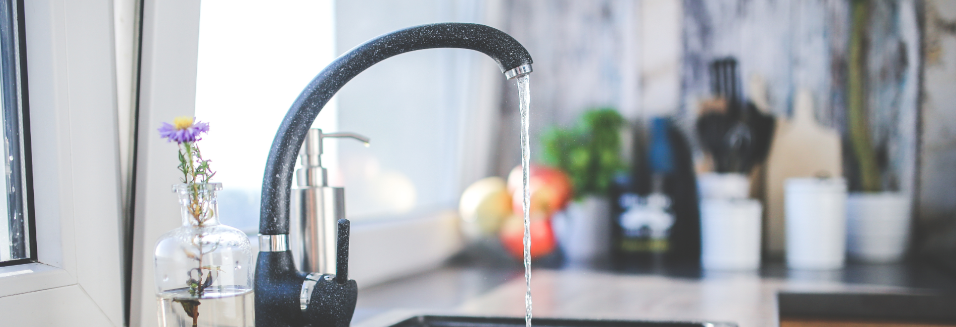 Kitchen sink with running water Water Conservation header