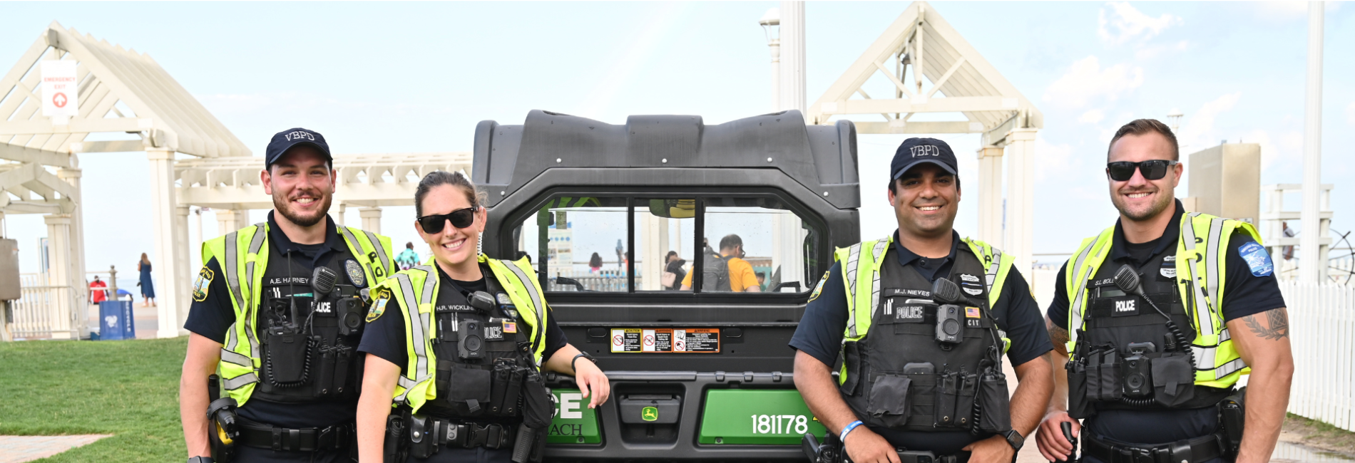 Four VBPD officers standing in front of gator vehicle
