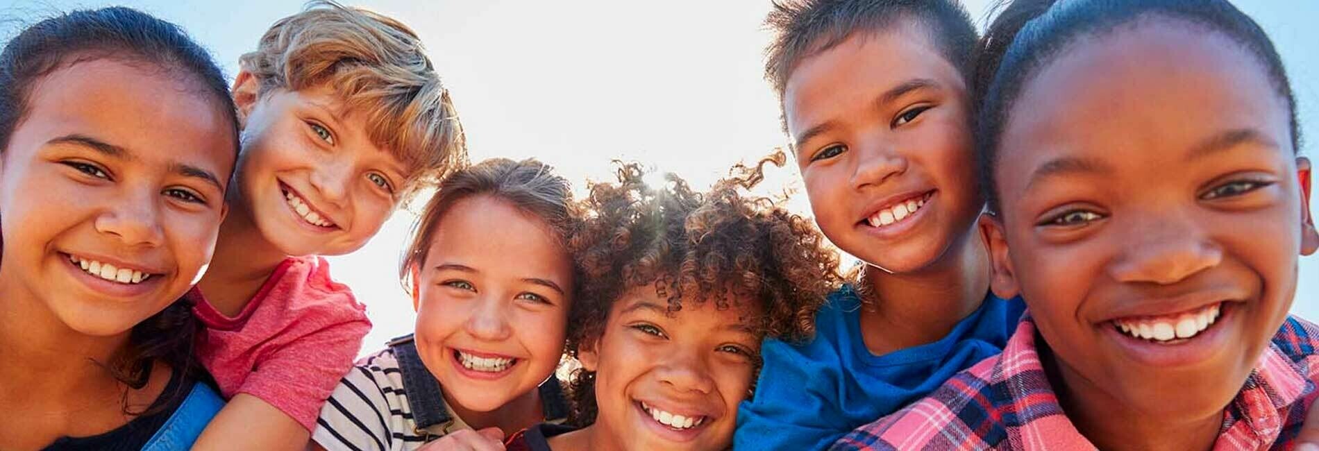 Kids smiling at camera