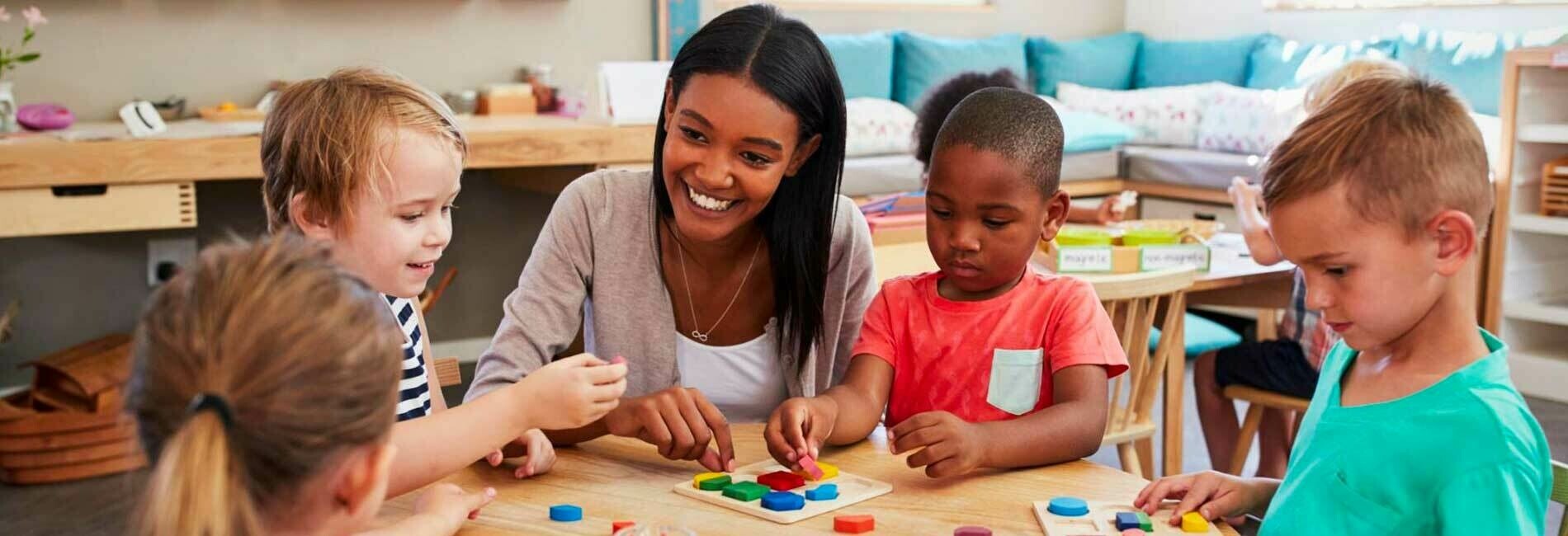 Childcare teacher with kids