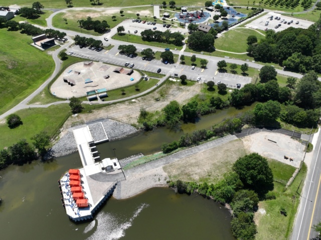 Windsor Woods tide gate from air with Kids Cove playground in background