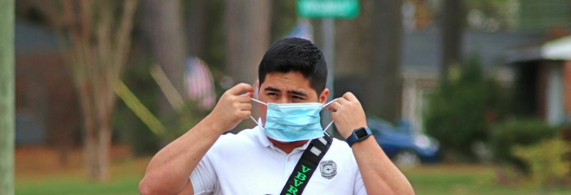 Paramedic Putting on Mask