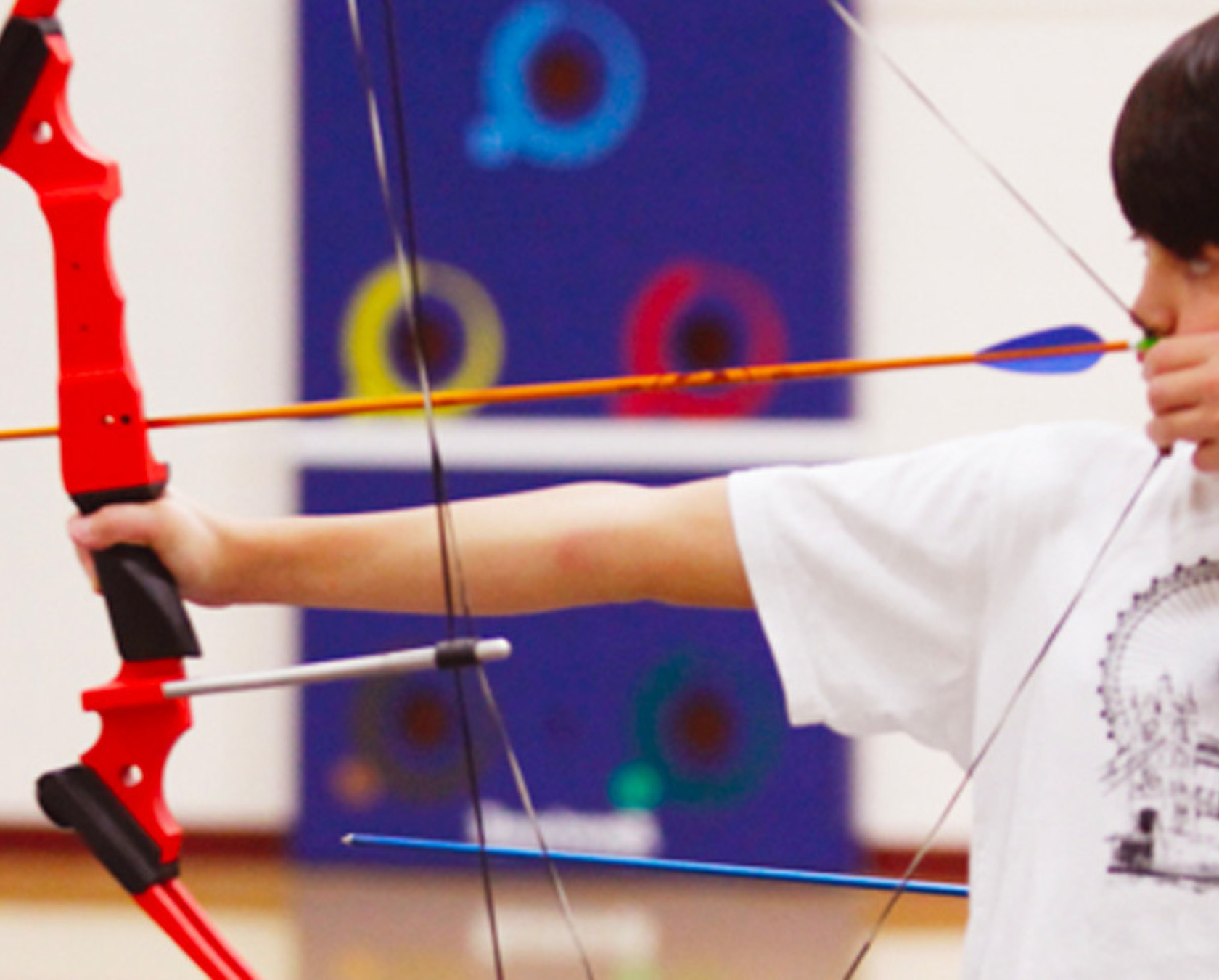 Child Shooting Bow and Arrow