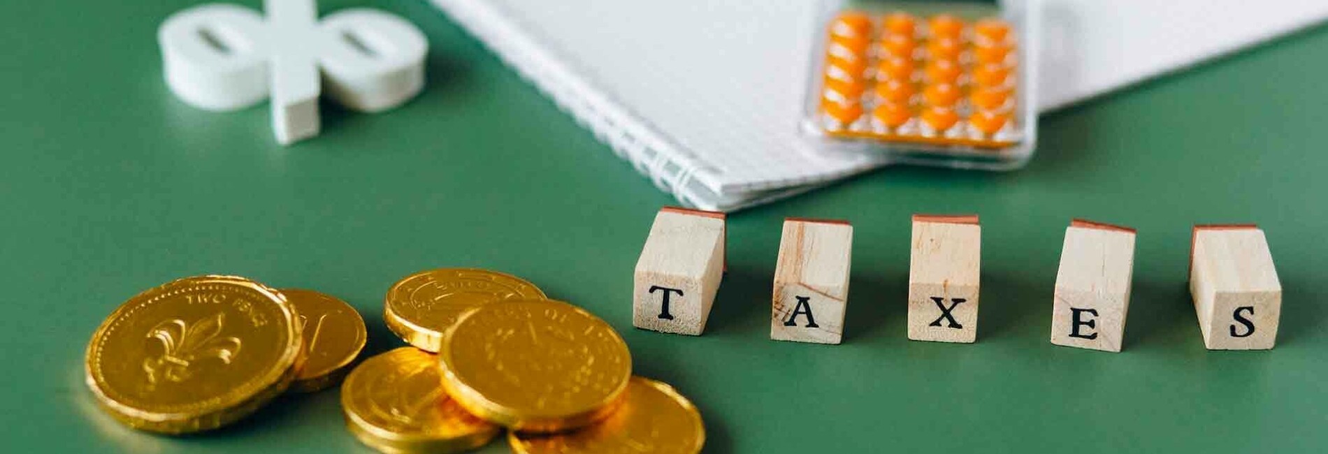 Wooden Letters Spelling Taxes